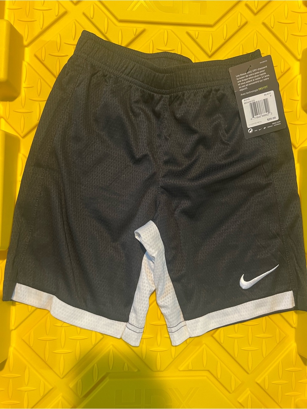 Nike kids Black Athletic Shorts with White Trim